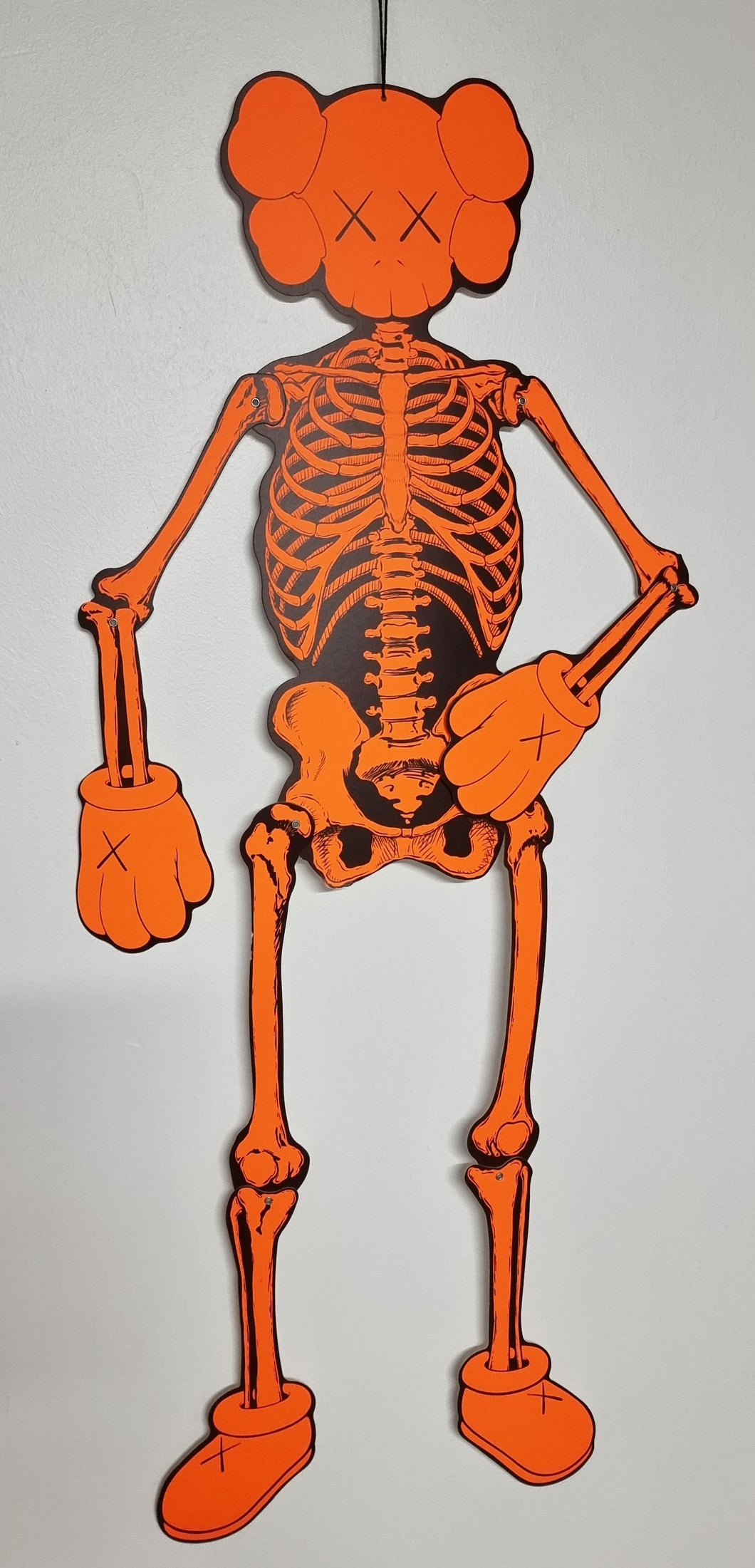 KAWS Skeleton Fluo Orange - screenprint on articulated cardboard