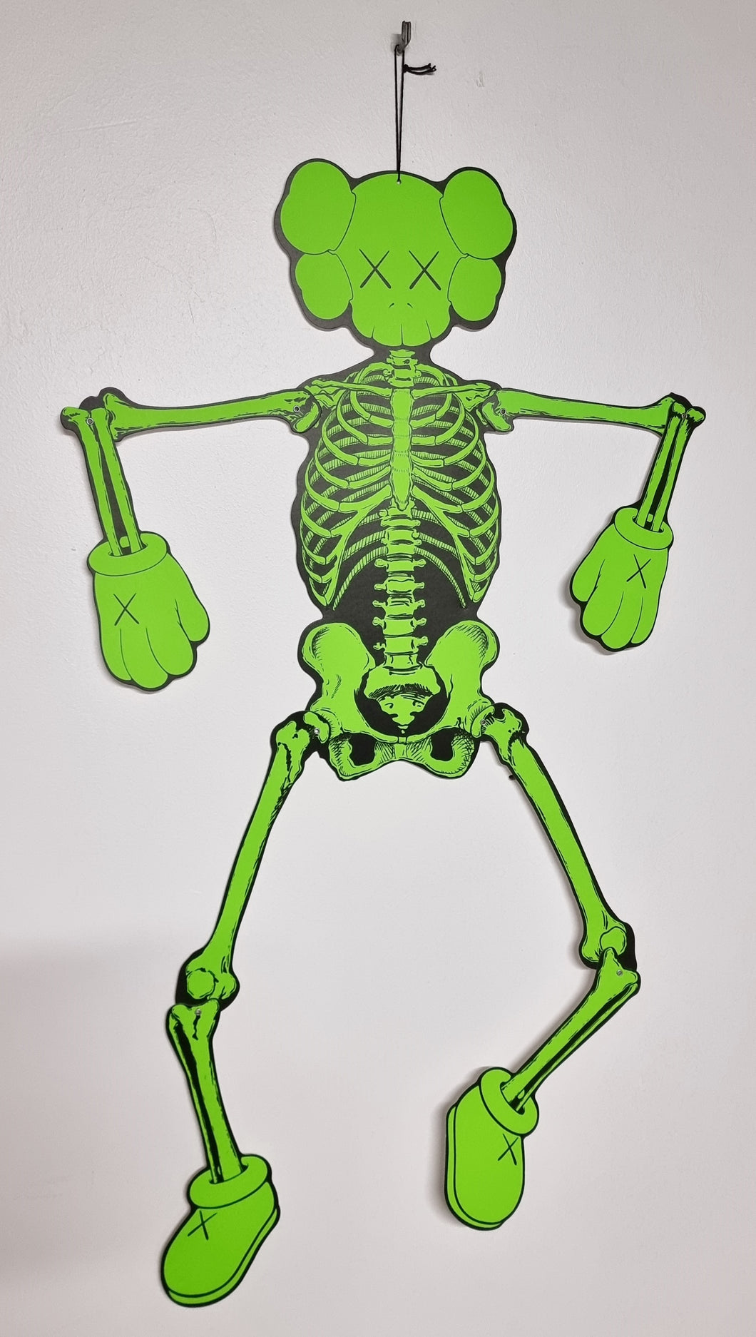 KAWS Skeleton Fluo Green - screenprint on articulated cardboard